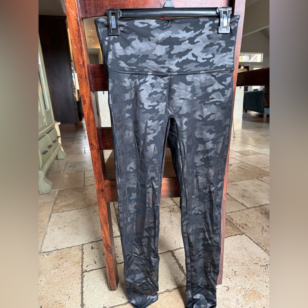 Worn only a few times. Camo print black and grey Spanx leggings